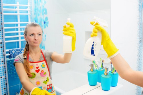 Cleaning professional preparing equipment for a booked service